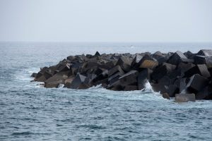 pile-breakwater-stones-coast_324531-216